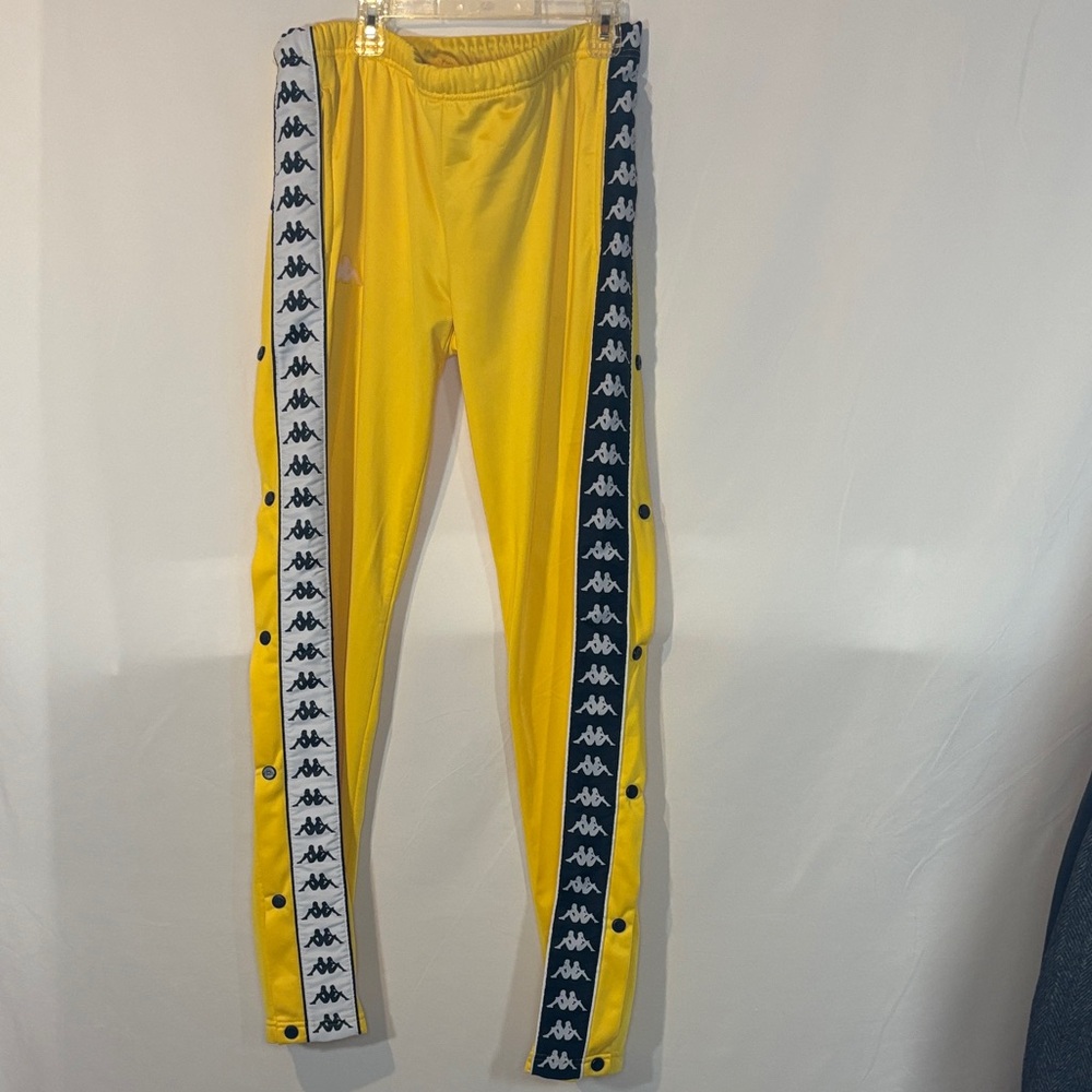 Kappa women’s Yellow tear away joggers with Logo Stripes